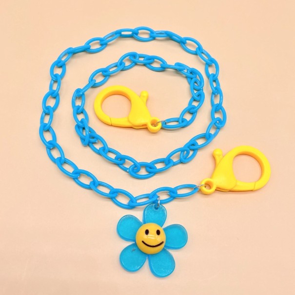 Porta mascarillas con forma de flor azul