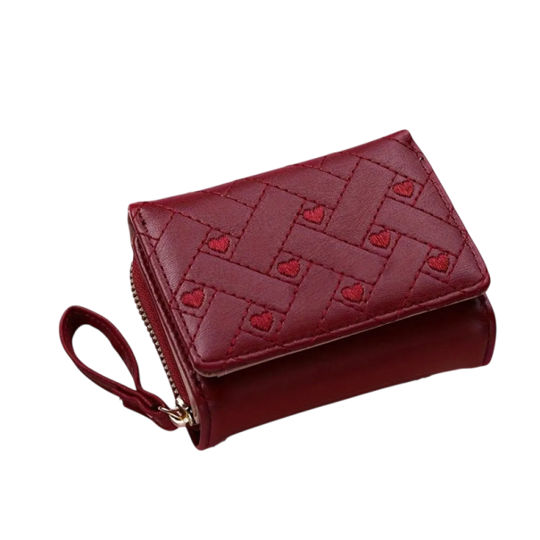 Portefeuille pour femmes avec des cœurs élégant, pratique et compact avec de la place pour 8 cartes, un compartiment pour les billets et un double compartiment pour les pièces avec fermeture éclair rouge