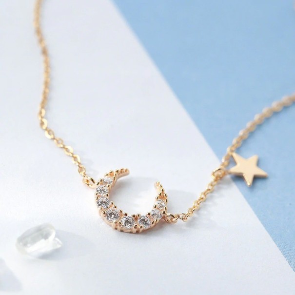 Pulseira feminina com lua e estrela dourado