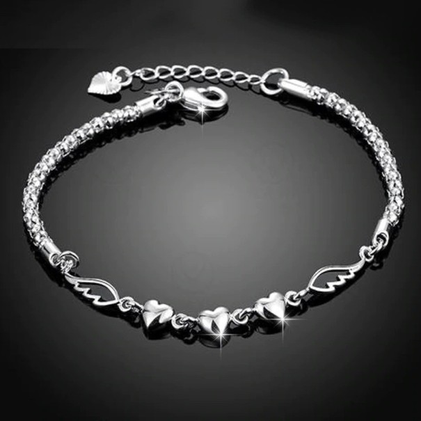 Pulsera de mujer con bolas de corazones y alas 1