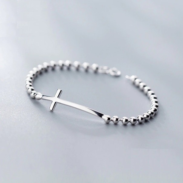 Pulsera de mujer con bolas y cruz 1