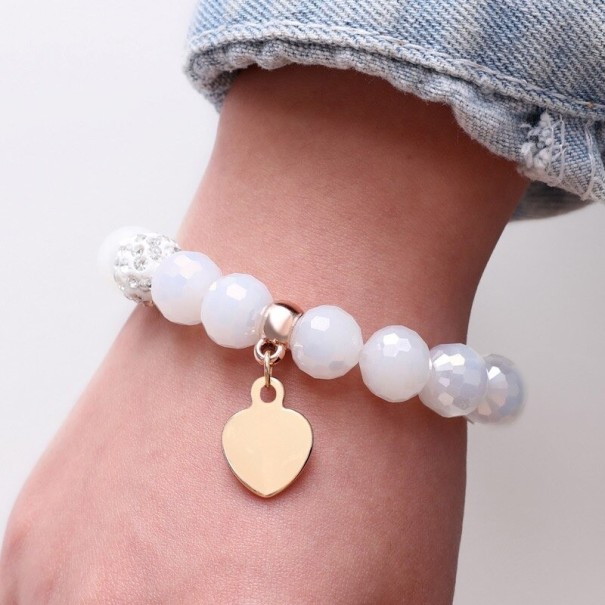 Pulsera de mujer con cuentas y corazón H350 2