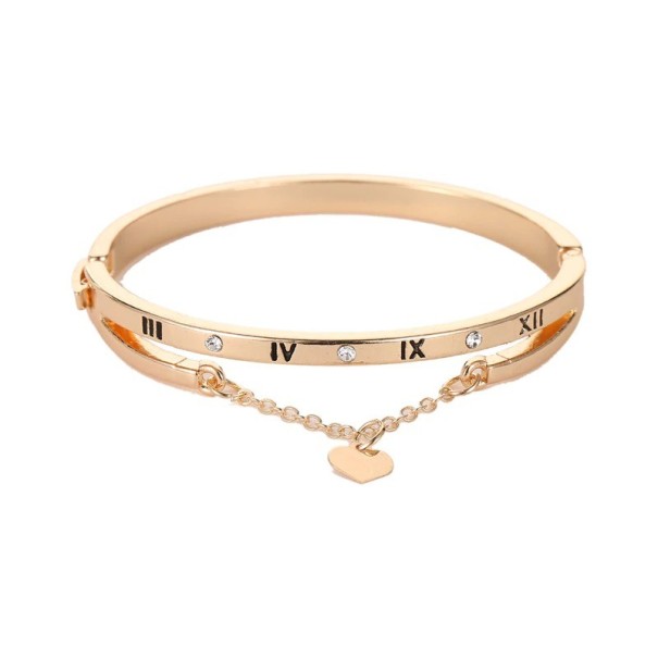 Pulsera de mujer con números romanos y corazones. dorado