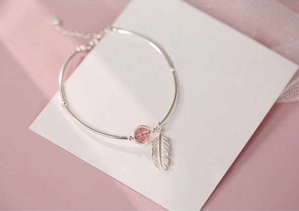 Pulsera de mujer con pluma A1645 1