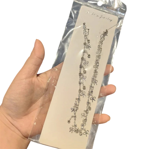 Řetízek na boty s mašličkami kovový stříbrný s háčky na tkaničky ozdobný řetěz na tenisky a obuv módní doplněk obuvi 1