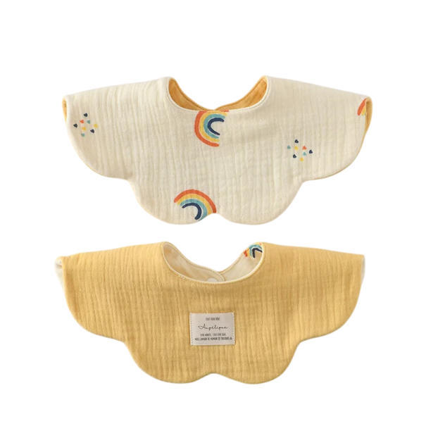 Reversible Bib for Children Beige Side with Rainbows and Small Colourful Hearts Bright Yellow Smooth Side Wavy Edge and Snap Fastener at the Neck 1