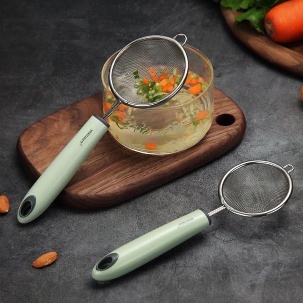 Rostfritt durkslag med handtag C442