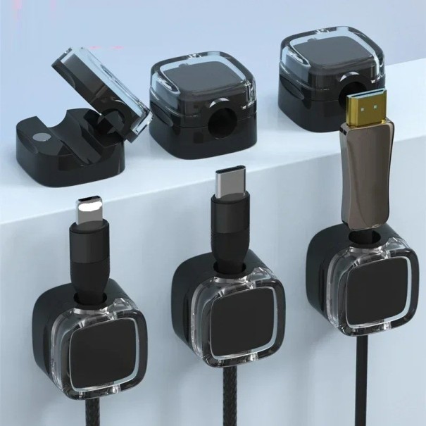 Sada 6 ks farebných magnetických držiakov na káble s lepiacou základňou pre správu vodičov 22x22x14,6 mm čierna