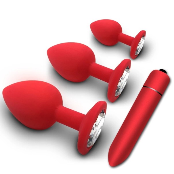 Set de tres tapones anales rojos de diferentes tamaños con piedra transparente extraíble y vibrador. Embalaje discreto. 1