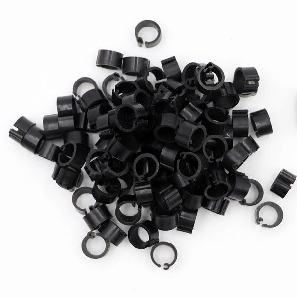 Set mit 100 Stück bunten 8 mm großen Vogelbeinringen. Kunststoffclips zum Beringen von Tauben, Papageien und Geflügel schwarz