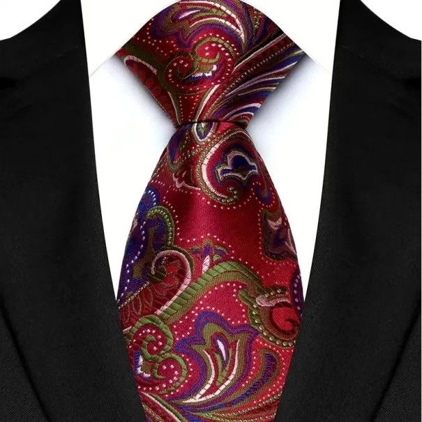 Silkkisolmio, jossa on erottuva kuvio, 145 x 8 cm. Laadukas silkki. Liike- ja sosiaalisiin tilaisuuksiin tarkoitettu ylellinen miesten solmio. Elegantti asuste. 1