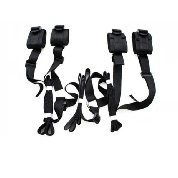 Sistema di cinghie in tessuto sotto il materasso con 4 uscite per manette in velcro, fissaggio per mani e piedi, attacco regolabile, confezione discreta nero