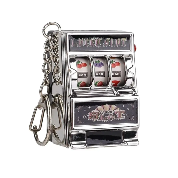 Sleutelhanger met een draaiende gokmachine 7 x 3 cm Kunststof sleutelhanger met een Pokemon-motief Sleutelspeelgoed Gadget voor kinderen en volwassenen zilver