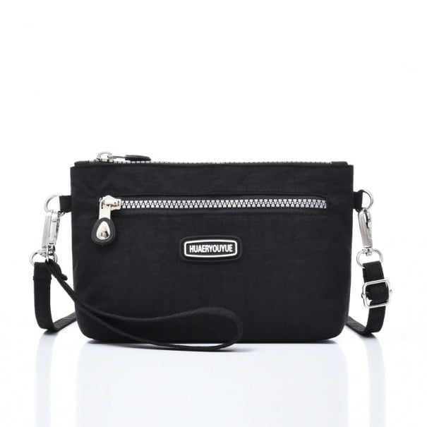 Small Women's Crossbody Bag Made of Nylon and Polyester Front Zip Pocket Wrist Strap and Shoulder Strap 22 x 12 x 6 cm black