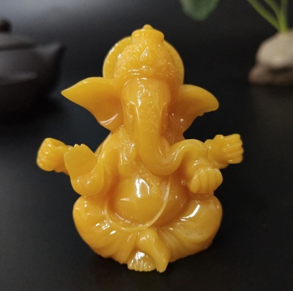Statua decorativa di Ganesha giallo
