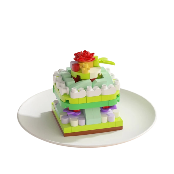 Stavebnica torty v tvare vrstveného zeleného dezertu s červeným kvetom 5,5 x 3,5 x 4,5 cm Farebná dekoratívna stavebnica sladkého dvojposchodového 1