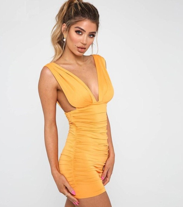 Strečové bodycon šaty žlutá M Strečové bodycon šaty žlutá M