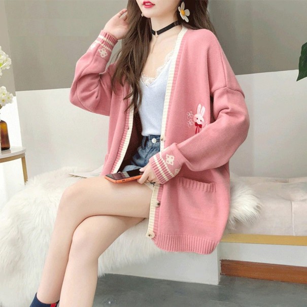 Suéter de mujer con conejo rosa