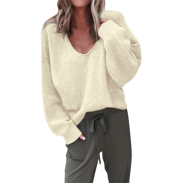 Suéter de mujer con escote profundo. crema M