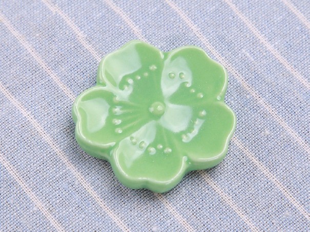 Suporte para paus de comer flor verde