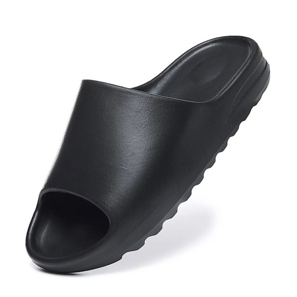 Svarta halkfria tofflor med mjuka sulor Lätta bekväma tofflor för hemmet Enkel minimalistisk design Moderna husskor
