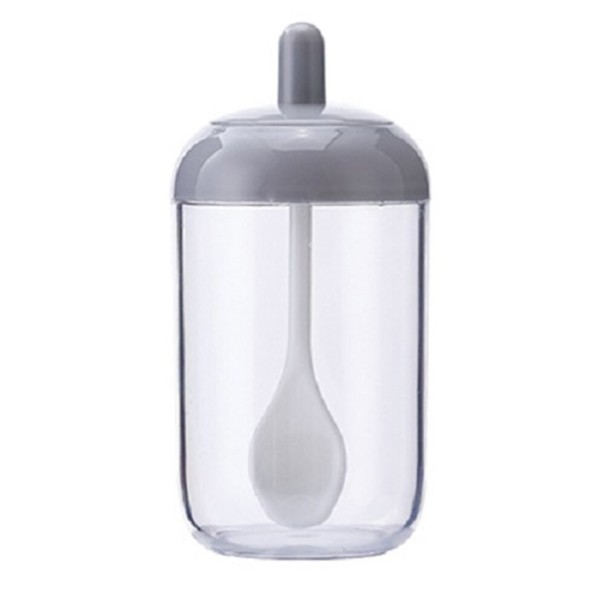 Tarro de especias con cuchara gris