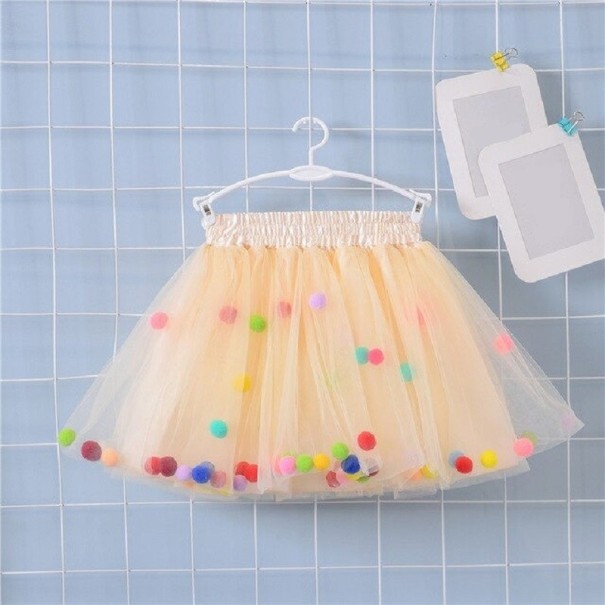 Tjejkjol med pompoms L1001 persikofärgad 5