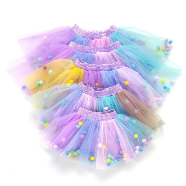 Tjejkjol med pompoms L1001