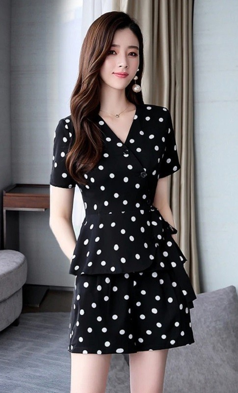 Top e pantaloni corti a pois da donna nero XL