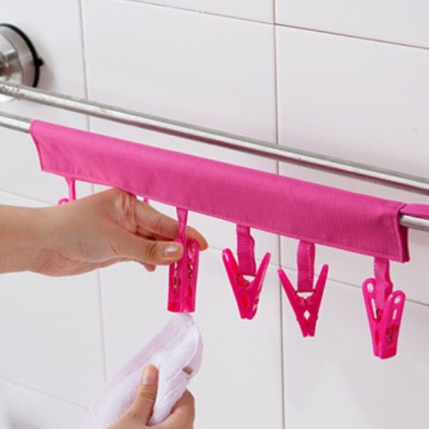 Tørrestativ med velcro-nåle mørkerosa