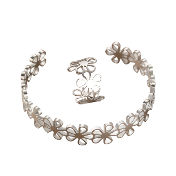 Usædvanligt retro sæt armbånd og ring Justerbar størrelse Rustfrit stål Hule blomster Fadede frie damesmykker gave sølv