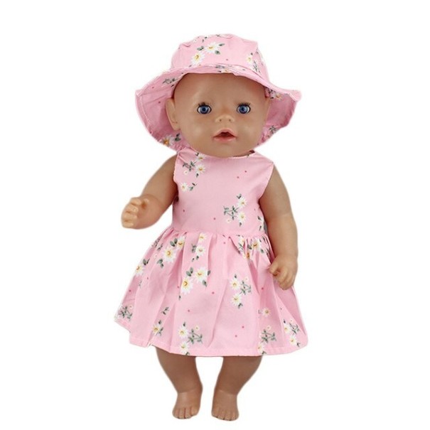 Vêtement pour poupées avec chapeau rose