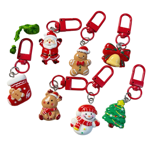 Vianočné kľúčenky 2,3 x 6,8 cm 10 ks Roztomilé prívesky Santa snehuliak perníček stromček los Farebné vianočné dary 1