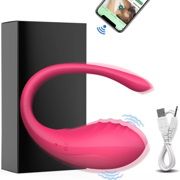 Vibrateur en silicone réversible en forme de U pour double stimulation avec application mobile comme télécommande dans un emballage discret rose