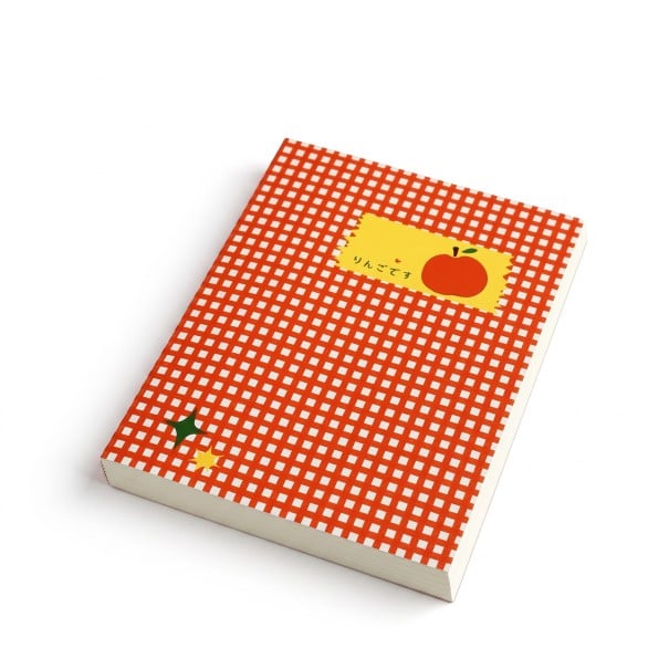 Viivaton vihko, jossa on 96 tyhjää sivua ja ruudullinen kansi, jossa on kuvaa sisältävä etiketti, sekä luonnosvihkona että ideoiden ja suunnitelmien muistiinpanovihkona punainen