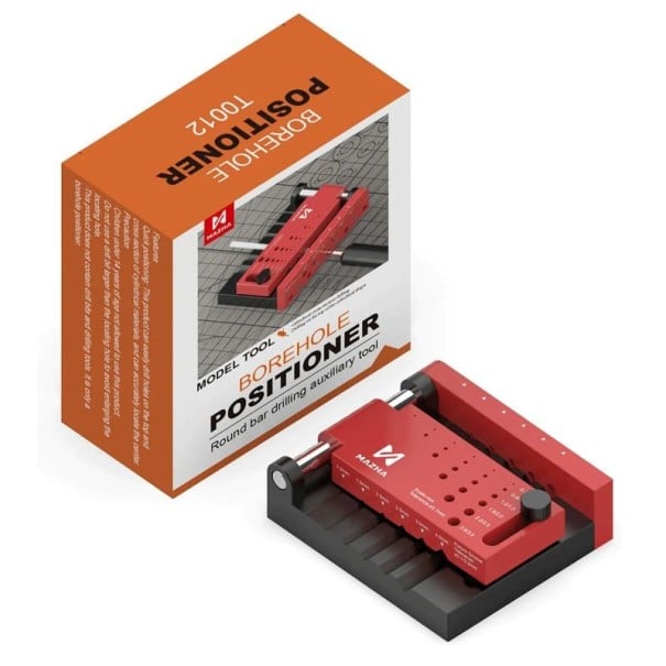 Vodicí přípravek pro vrtání kulatých tyčí středový upínací lokátor plast kov červeno černý pro přesné vrtání hobby a modelářství 1