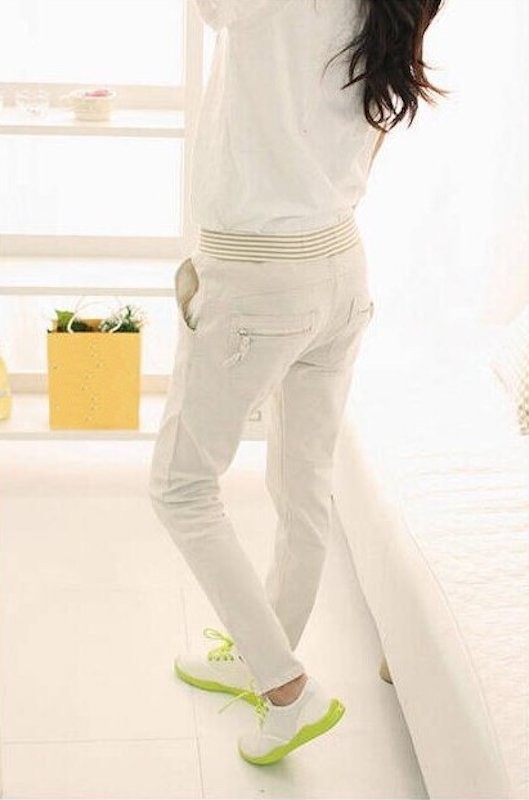 Wąskie spodnie damskie biały L
