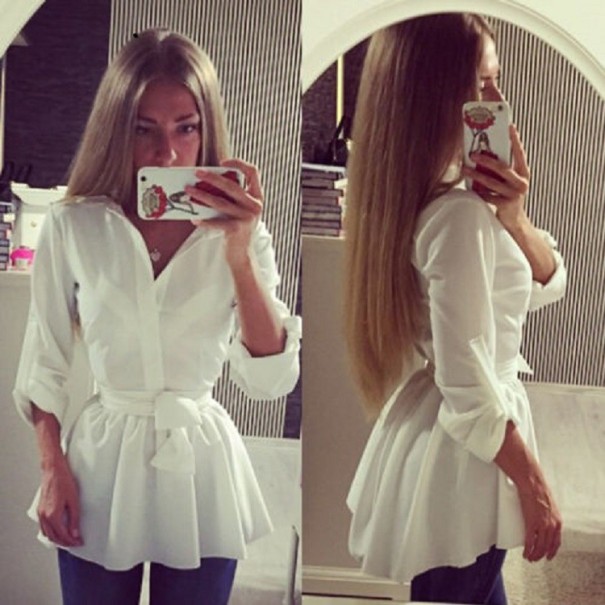 Witte blouse met strikjes
