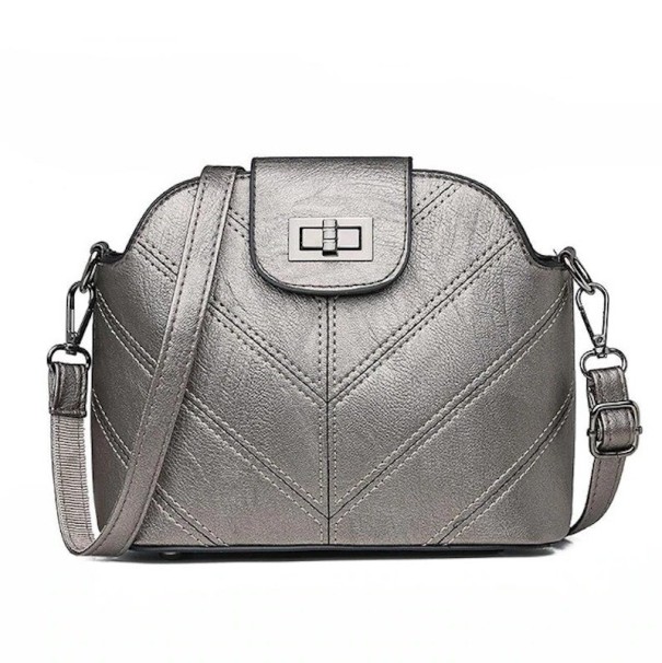 Women's crossbody handbag 21 x 18 x 10 cm made of synthetic leather Quilted V pattern Flap with rotating lock Adjustable shoulder strap silver