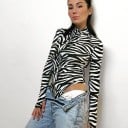 Body de mujer con estampado de cebra 1