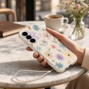 Silikonfodral för Samsung Galaxy S24 med handledsrem och mönster av tecknade blommor, skydd för kameran 15