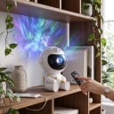 Stjärnprojektor Astronaut med flygplan Projektion av nebulosor och stjärnor Fjärrkontroll Roterande huvud 360° 13 cm Vit Rumsdekoration 2