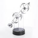 Kinetisk dekoration perpetuum mobile med delfiner 30 cm Metal balance pendul på gennemsigtig stander På AA-batterier Til kontor og hjem 1