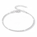 Tobillera femenina delicada cadena brillante para tobillo Diseño minimalista simple Color plateado Longitud ajustable Joyería de verano para la playa 1