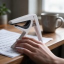 Kytarový kapodastr 7,5 x 9 cm pružinový mechanismus měkké podložky vytahovač kolíčků pro akustickou i elektrickou kytaru 2