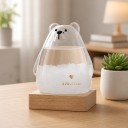 Bouřkové sklo Storm Glass ve tvaru ledního medvěda 8 x 12 cm Skleněný barometr s krystaly na dřevěném podstavci Dekorace 4