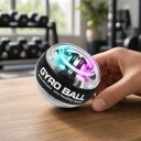 Bola de fortalecimento giroscópica com iluminação LED e autostart 7 x 5,5 cm Rotor metálico Laço Treinador de pulso e agarre 2