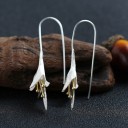 Boucles d'oreilles pour femmes avec des fleurs 2