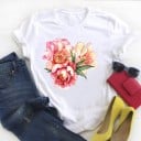 Dam T-shirt med blommotiv 9