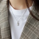Damhalsband med tegelsten 1